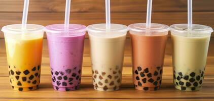 Plastic cups of different tasty bubble tea on wooden background. Generative AI photo