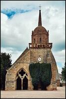 Exterior View of Pink Granite Church in Perros Guirec, French Brittany photo