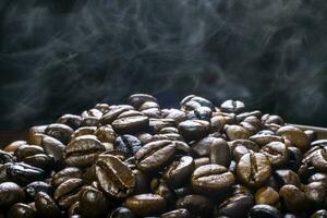 Coffee beans roasting with smoke,  selective focus, and soft focus. photo