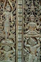 ancient carvings on a temple photo