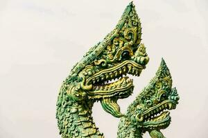 Old oriental dragon statues photo