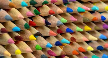 side view, pattern of Stacked crayons, Close-up showing different colors as a background, Background concept, Education concept, different concept photo