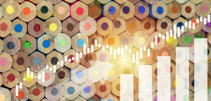 Stacked of crayons with Up arrows, business graphs and charts, Candle stick graph chart of stock market investment trading, Statistic and data, Financial and economy, Business growth concept. photo