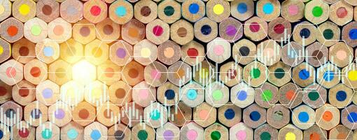 Pattern of stacked crayons with business candle stick graph chart of stock market investment trading, Statistic and data, charts diagrams, Financial and economy concept. photo