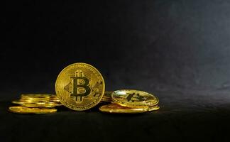 Golden Bitcoin, Bitcoin in the middle of circle of stack on dark blue background. Crypto currency concept. photo