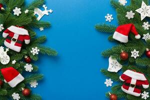 Christmas background with fir branches and Christmas decor. Top view, copy space for text photo