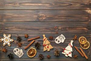 New Year composition. Christmas decor background with pine cones. Top view with copy space photo