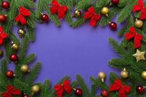 Christmas background with fir branches and Christmas decor. Top view, copy space for text photo