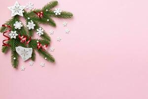 Christmas background with fir branches and Christmas decor. Top view, copy space for text photo