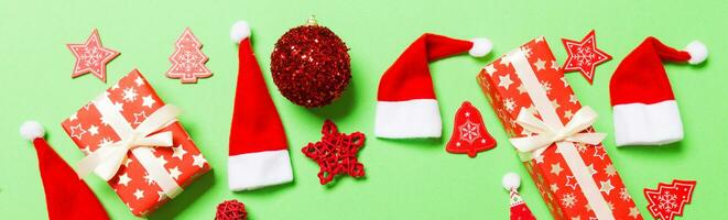 Top view of Banner Christmas decorations on green background. New Year holiday concept with copy space photo