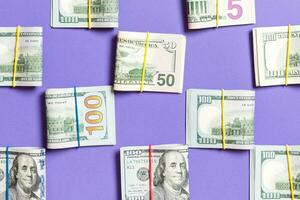 colored Background with money american hundred dollar bills on top wiev with copy space for your text in business concept photo