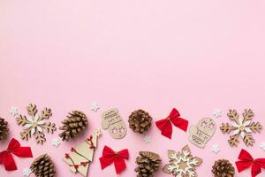 New Year composition. Christmas decor background with pine cones. Top view with copy space photo