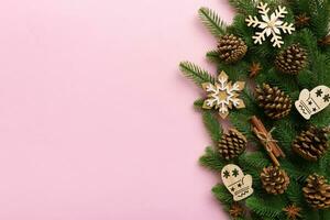 Christmas background with fir branches and Christmas decor. Top view, copy space for text photo