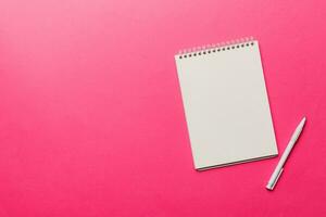 Blank notebook with pen on white background. Back to school and education concept photo