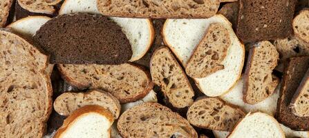 Many slices of bread as background. Top view photo