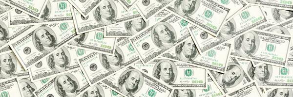 vista superior de billetes de cien dólares hechos como fondo. concepto de moneda usd. textura de dolares americanos foto