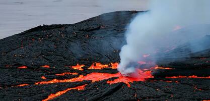 Volcanic eruption lava material red lava hot magma photo