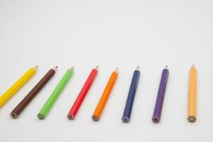 pack of 12  mini colored bunch wood  pencils isolated on a white background with  copy space photo