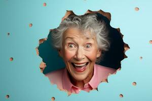 A senior woman smiles against a pastel background with holes in advertising style photo