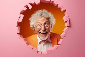 A senior man smiles against a pastel background with holes in advertising style photo