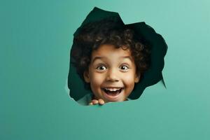 A boy smiles against a pastel background with holes in advertising style photo