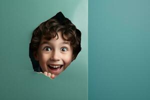 A boy smiles against a pastel background with holes in advertising style photo