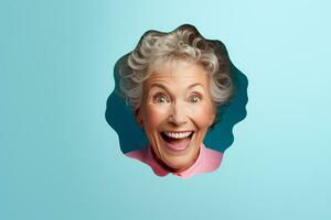 A senior woman smiles against a pastel background with holes in advertising style photo