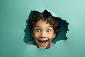 A boy smiles against a pastel background with holes in advertising style photo