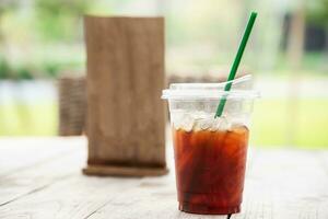 freshy ice tea cup in the natural garden background photo