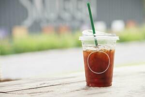 freshy ice tea cup in the natural garden background photo