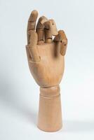 The wooden arm of a mannequin. photo