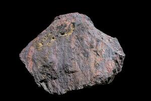 Meteorite isolated with black background. photo