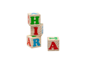 crianças de madeira cubos com azul, vermelho e verde cartas dentro a forma do uma torre ficar de pé 1 em topo do a de outros e mentira lado de lado. para texto. Alto qualidade foto. png