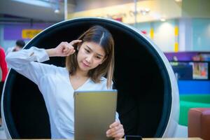 Her thoughtful expression conveys her expertise in digital marketing and her commitment to delivering the best results for her clients, Digital marketing. photo