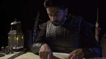 The commander who analyzes on the map. video