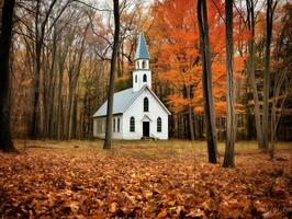 a small white wooden Protestant church in an autumnal American forest in New Hampshire   generative AI photo