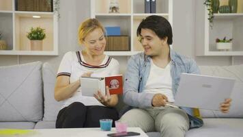 Emotional moments of mother and son looking at family album. video