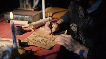 Writing letters with pen and paper in ancient times. Historical scenes. video
