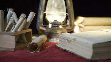 Medieval war sword and map. On Candlelight. video
