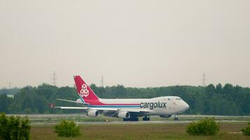 NOVOSIBIRSK, RUSSIAN FEDERATION JUNE 10, 2020 - Boeing 747 of Cargolux taxiing at Tolmachevo airport. Huge widebody transport cargo aircraft video