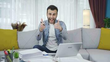 Portrait of freelance businessman rejoicing at his success. video