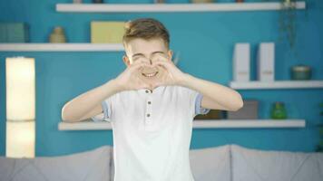 Boy in love making heart with love. video