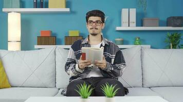 Young man fascinated by the book. video