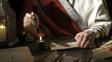 Melting sealing wax in ancient times. video