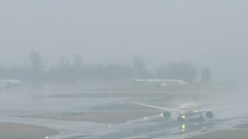 PHUKET, THAILAND FEBRUARY 03, 2023 - Boeing 787 of Etihad Airways take off in the rain at Phuket airport. Flight departure. Aircraft accelerating on a wet runway. Tourism and travel concept video