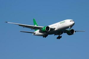 Turkmenistan Airlines Boeing 777-200 EZ-A779 passenger plane arrival and landing at Istanbul Ataturk Airport photo