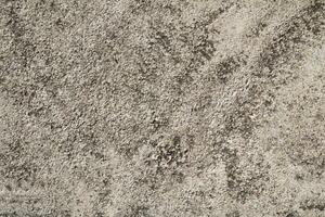 Cracked and abstract grunge texture. Aged material surface backdrop. Weathered effect pattern. Old and dirty background. photo