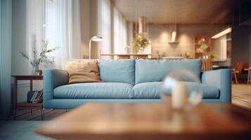 Modern sofa in focus and blurred living room design at background. photo