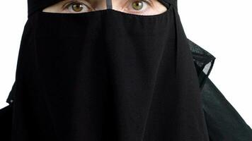 a woman wearing a black veil video