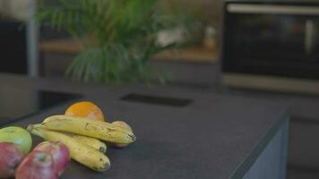 a kitchen counter with fruit on it video